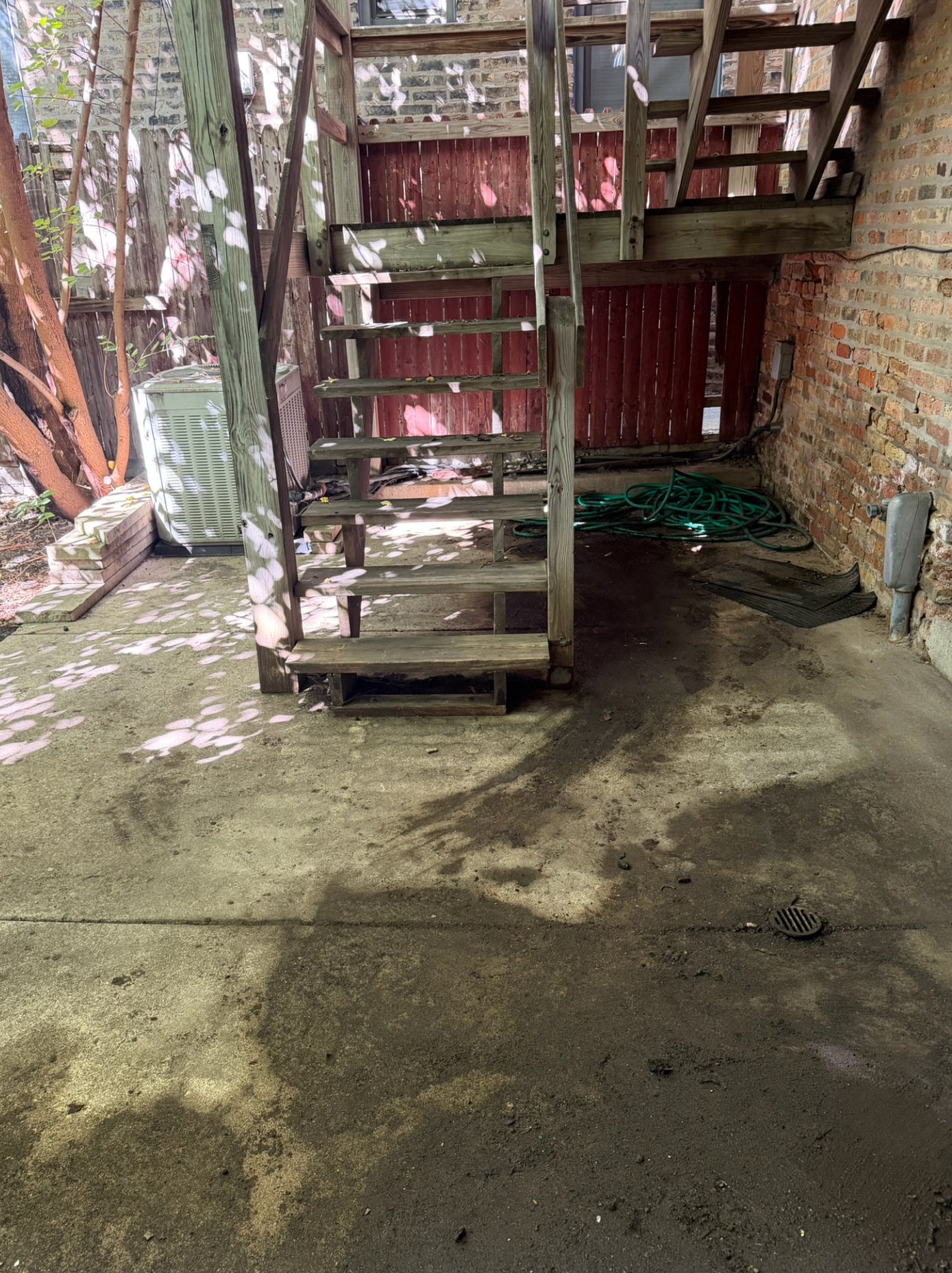 The same patio area after all debris was hauled away, clean and clear